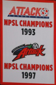 Kansas City Attack banner hanging from the raptors of Cable Dahmer Arena recognizing the team's NPSL championships in 1993 and 1997.
