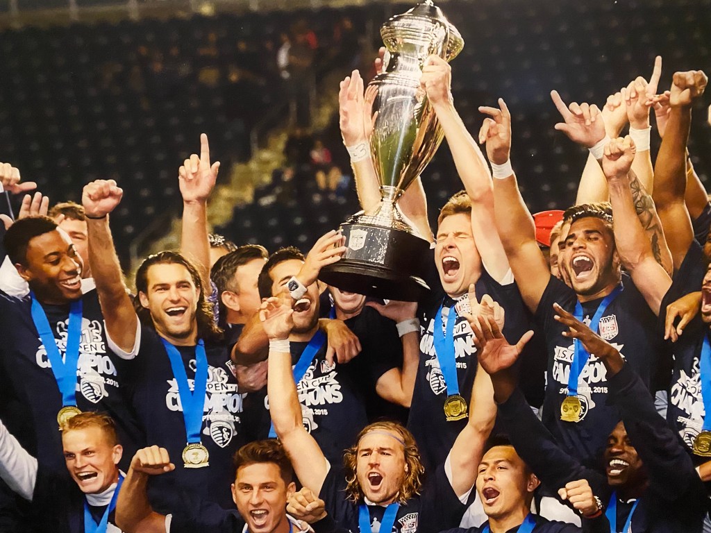 Matt Besler screams of joy as he lifts the 2015 Lamar Hunt U.S. Open Cup for Sporting KC.